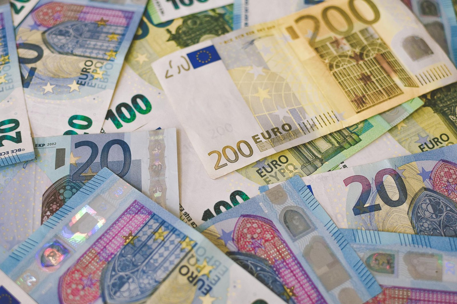 Image of various Euro banknotes spread out, captured in Berlin.